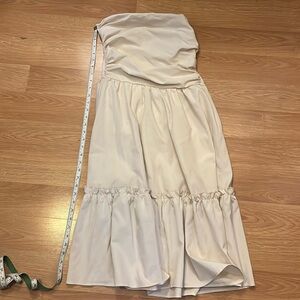 Lovely beige spandex dress. Perfect for any special occasion . Very elegant